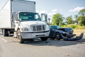 A collision with a truck and a car
