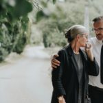 A concerned couple walking down the street