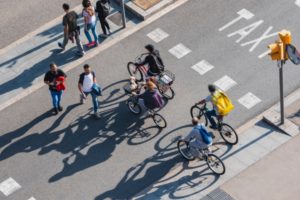 Multiple bicycles crossing at a crosswalk